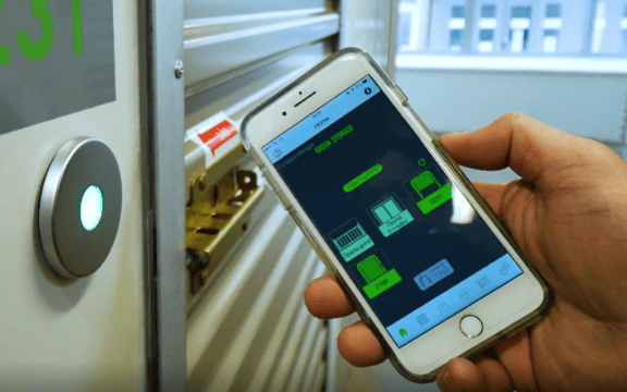 Unlocking self storage unit with mobile phone