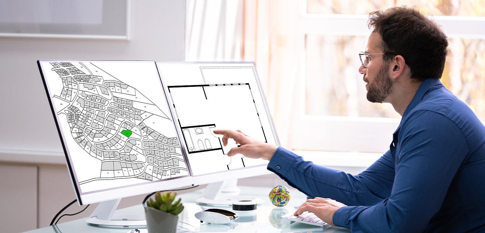 bigstock-Developer-Looking-At-Land-Plot-421150001
